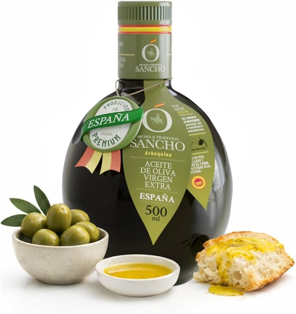 Bouteilles d'huile d'olive extra vierge espagnoles alignées sur bois rustique